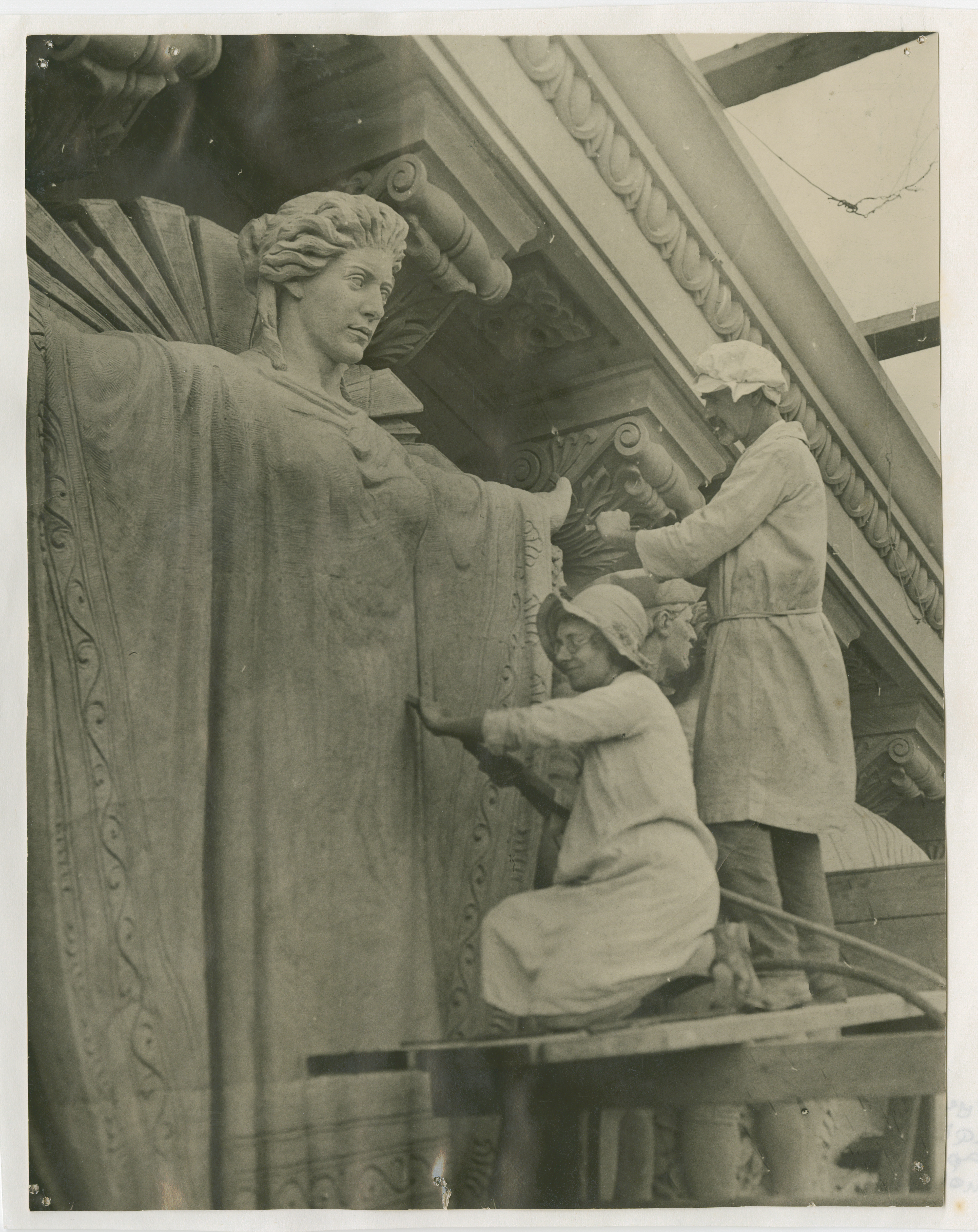 Daphne Mayo working with John Theodore Muller on the central figure of the Brisbane City Hall tympanum