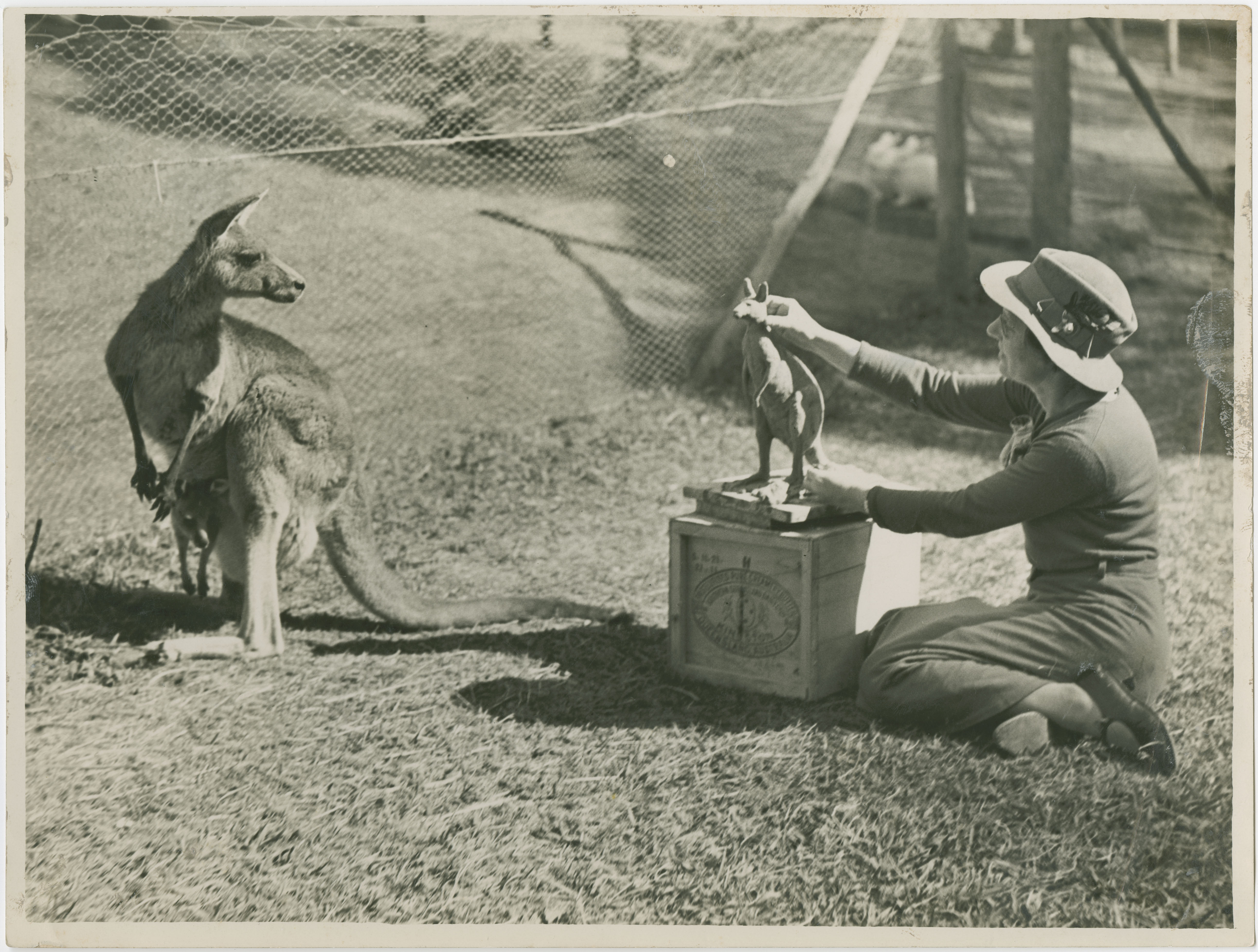 Daphne Mayo sculpting a kangaroo at Lone Pin Koala Sanctuary 