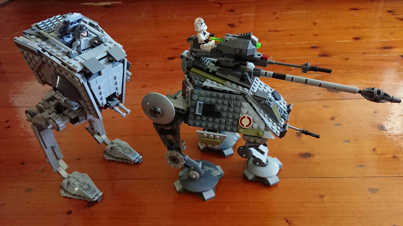 The AT-ST Walker has 2 legs and the AT-AP Walker has 3 legs and longer guns