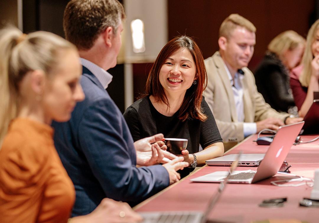 Staff seated at a table