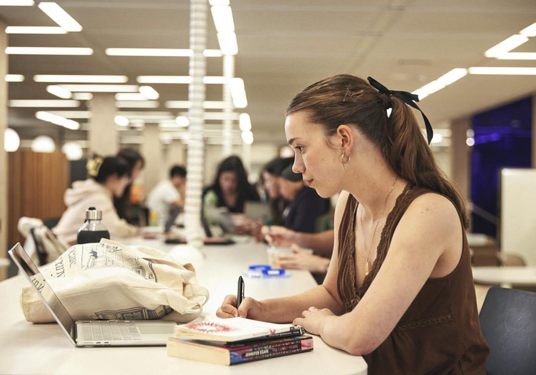 A student studying in Central Library.