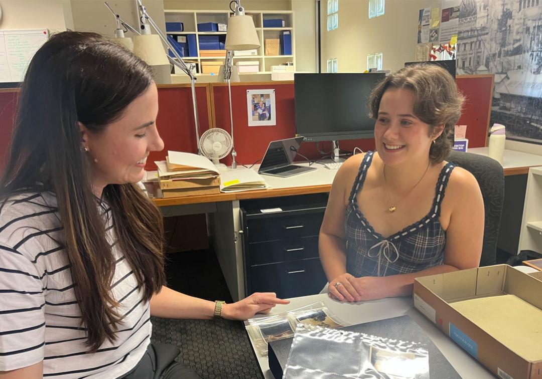 Juliette Byers (right of photo) with a Fryer Library staff member.