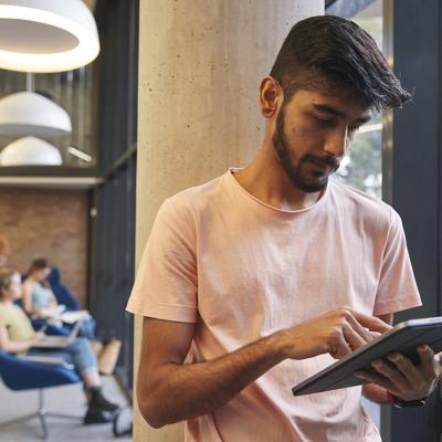 student with device