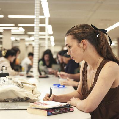 A student studying in Central Library.