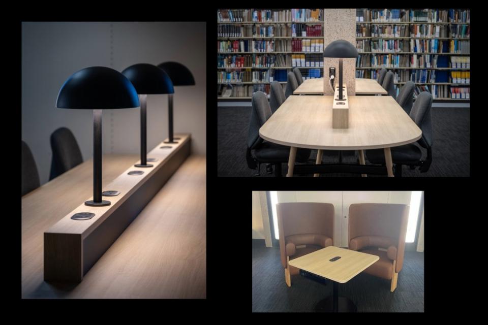 Low-light-lamps on a desk and high-backed chairs. 