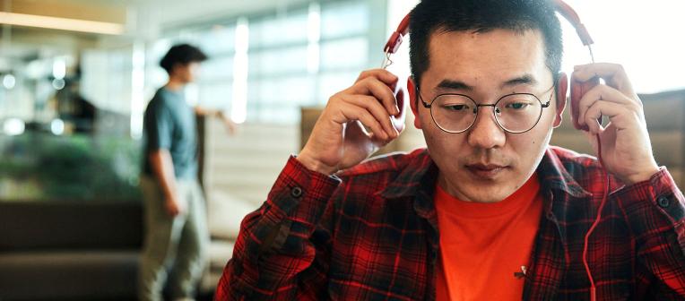 student with headphones