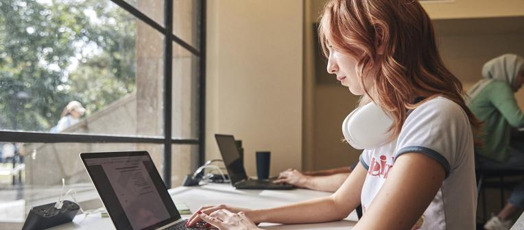 student using a laptop