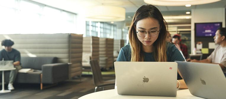 Student working on a laptop.