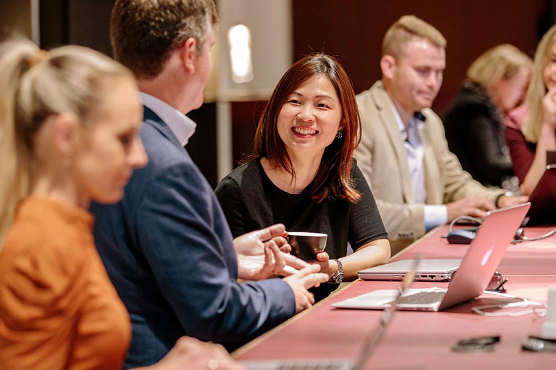 Staff seated at a table