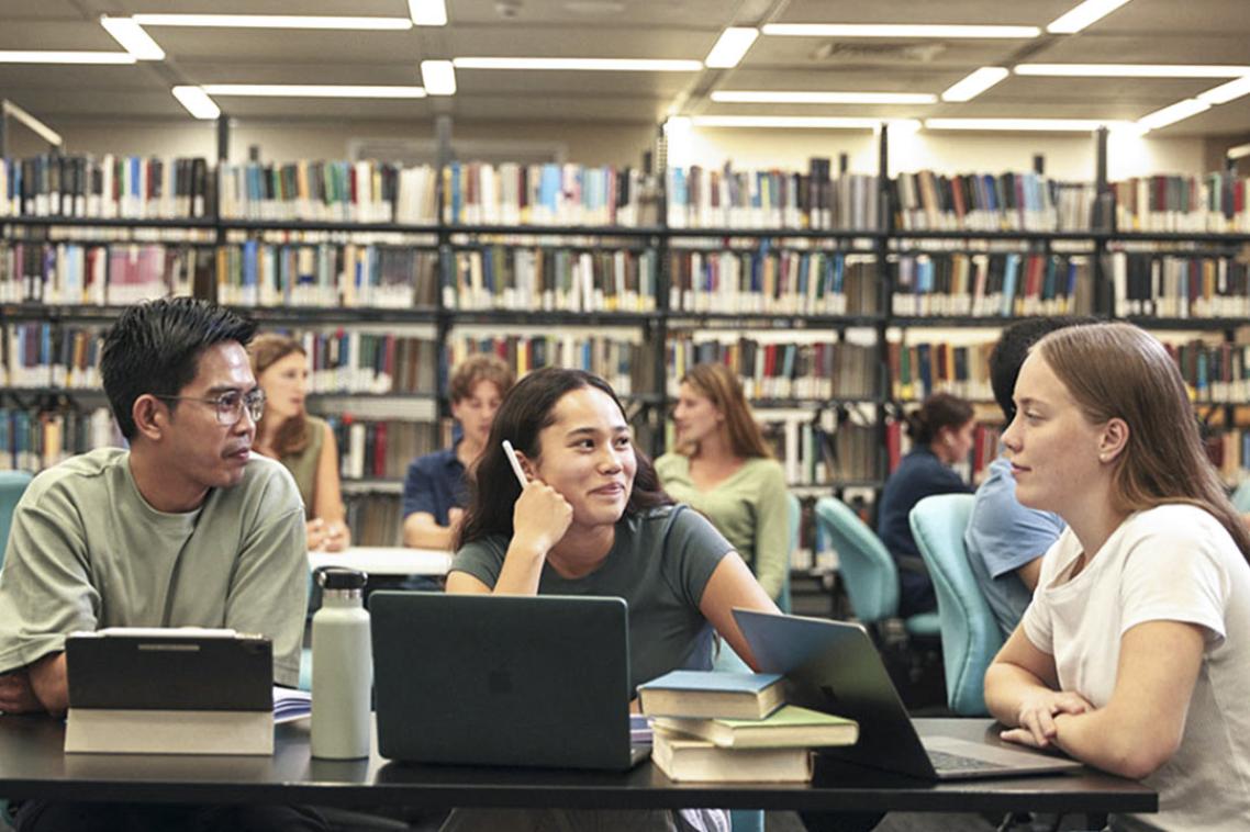 students studying at a table